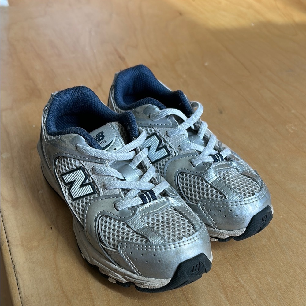 New Balance Silver Sneakers with Mesh Upper and Cushioned Midsole